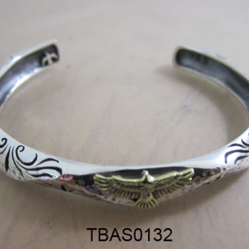 Scroll cuff